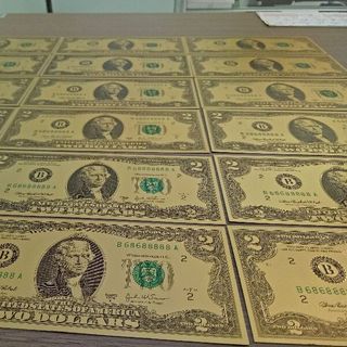 2 usd mạ vàng - đô la mạ vàng