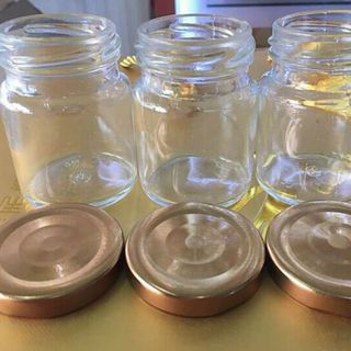 hủ thủy tinh đựng yến 70ml nắp xiết màu vàng đồng