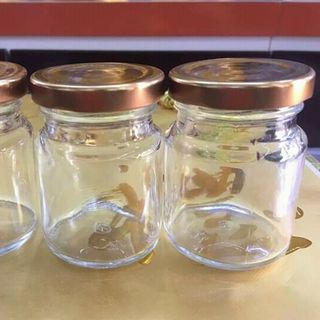 hủ thủy tinh đựng yến 70ml nắp xiết màu vàng đồng