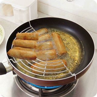 Vỉ gác chảo