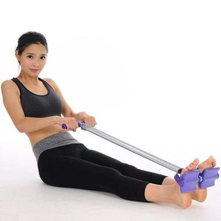 Lò xo tập bụng TUMMY TRIMMER