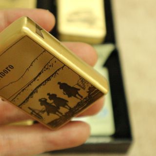 Zippo đồng Malbro