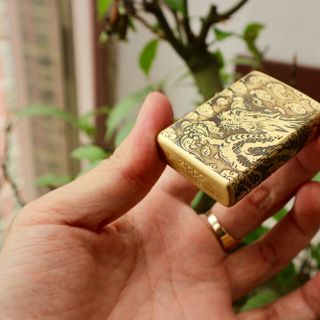 Zippo đồng khắc rồng nổi