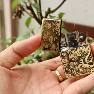 Zippo đồng khắc rồng nổi