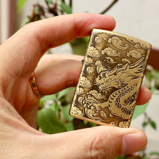 Zippo đồng khắc rồng nổi