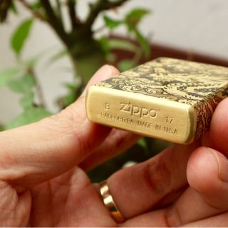 Zippo đồng khắc rồng nổi