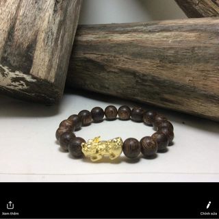 Vòng tay trầm hương sánh chìm nước charm bạc ta mạ vàng 18k sỉ lẻ toàn quốc