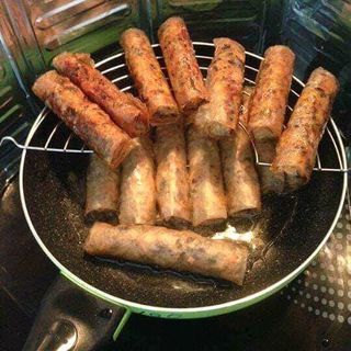 vỉ gác chảo dầu mỡ