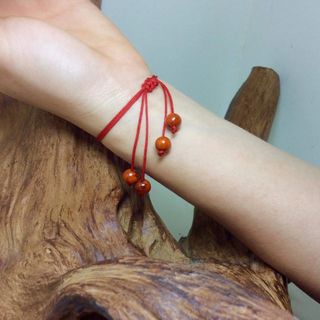 Huyết long tết chỉ đỏ charm bạc ta mạ vàng 18k