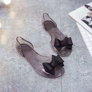 GIÀY NHỰA TRONG SUỐT ĐÍNH NƠ