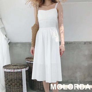 đầm hai dây đi biển