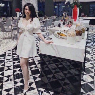 Đầm nhún rút dây