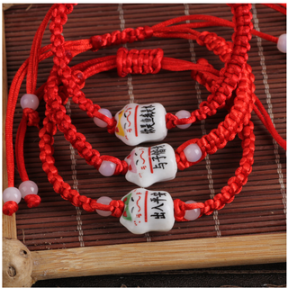 Vòng tay chỉ đỏ mau mắn mặt mèo sứ