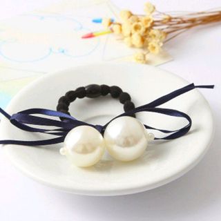 cột tóc hạt trai trắng lớn