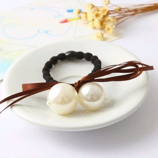 cột tóc hạt trai trắng lớn