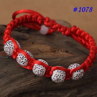 Vòng chỉ đỏ hạt châu chấm đen