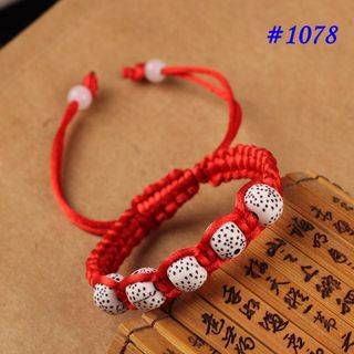 Vòng chỉ đỏ hạt châu chấm đen