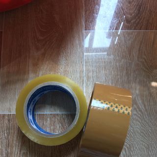 cây 12kg / 6 cuộn băng keo Ya 100 trong đục