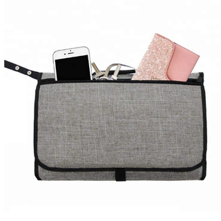 THẢM THAY TÃ CHO BÉ KIÊM TÚI CHO MẸ