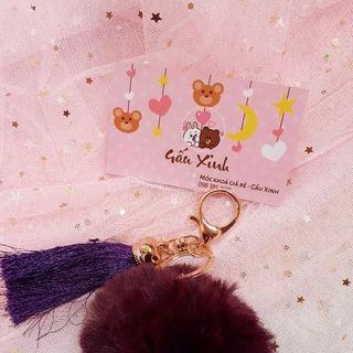 Móc khoá cục bông kèm tua