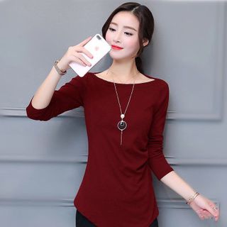 Áo cổ thuyền vạt nhọn