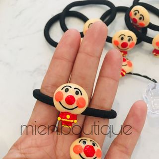 Cột kẹp toc chú hề