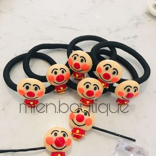 Cột kẹp toc chú hề
