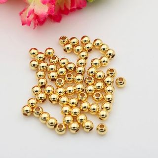 hạt kim loại màu vàng dùng để xõ chuỗi đeo tay phong thủy