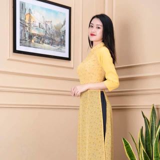 Áo dài hoa nhí phối tay màu vàng