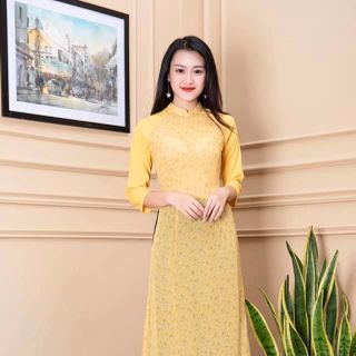 Áo dài hoa nhí phối tay màu vàng