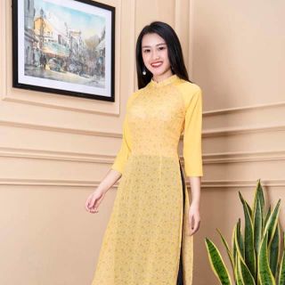 Áo dài hoa nhí phối tay màu vàng