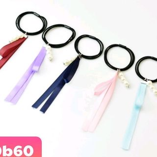 cột tóc phong cách Hàn Quốc đủ màu lun