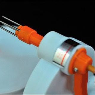 dụng cụ gọt vỏ táo có dao bổ đi kèm