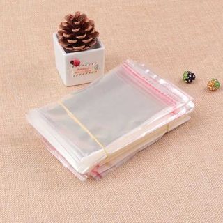 1 KG Bọc Kiếng Keo Đựng Quần Áo - TÚI NILON CÓ KEO DÁN - size 25x33cm
