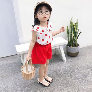 Chấm bi nơ sau bé gái