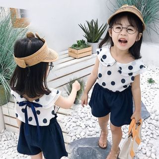 Chấm bi nơ sau bé gái