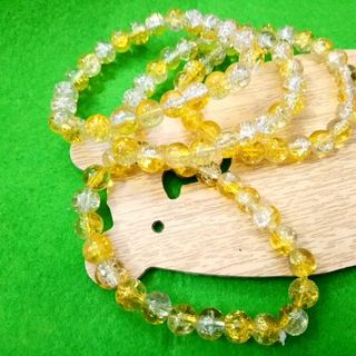 Vòng tay phong thủy đá tuyết vàng 8li