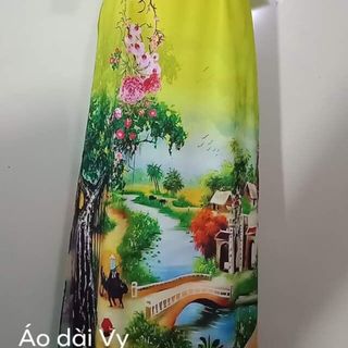 Áo dài may sẵn vàng phong cảnh