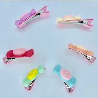 Kẹp mái bọc ruy băng hình kẹo