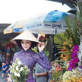 Áo dài hoa nhí màu tím