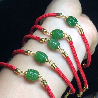 Vòng lu thống ngọc bích mix kèm dây đỏ mạ vàng