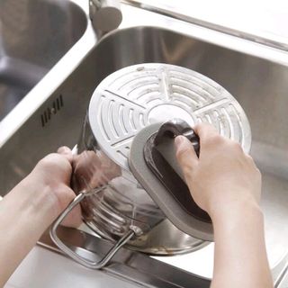 bàn chải cọ rửa ma thuật có tay cằm