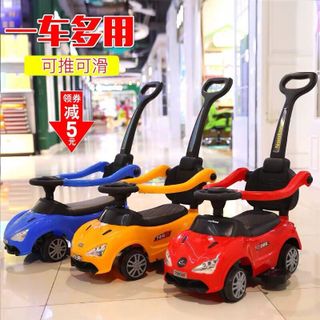 Xe chòi chân ô tô nhạc có cây đẩy loại trung