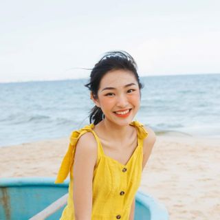 Đầm xòe 2 dây thắt nơ vai