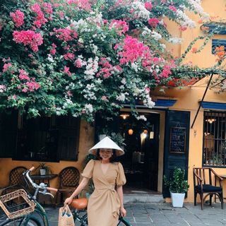 Đầm TK nude xoắn khoen
