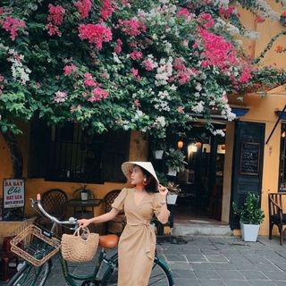 Đầm TK nude xoắn khoen