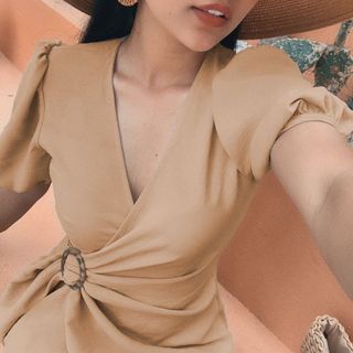 Đầm TK nude xoắn khoen