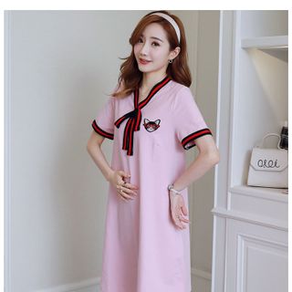 Đầm bầu công sở cột nơ thêu mèo