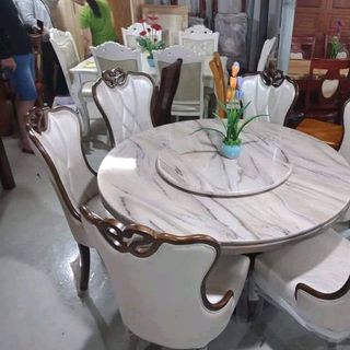 Bàn ăn mặt đá tròn xoay hiện đại 1m3 6 ghế