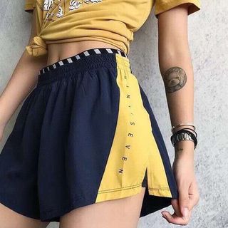 Quần tập đùi dù Seven 2019